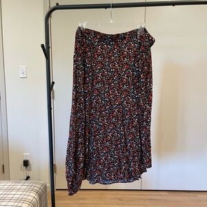 CHANEL Asymmetrical Skirt in Red and Black Floral